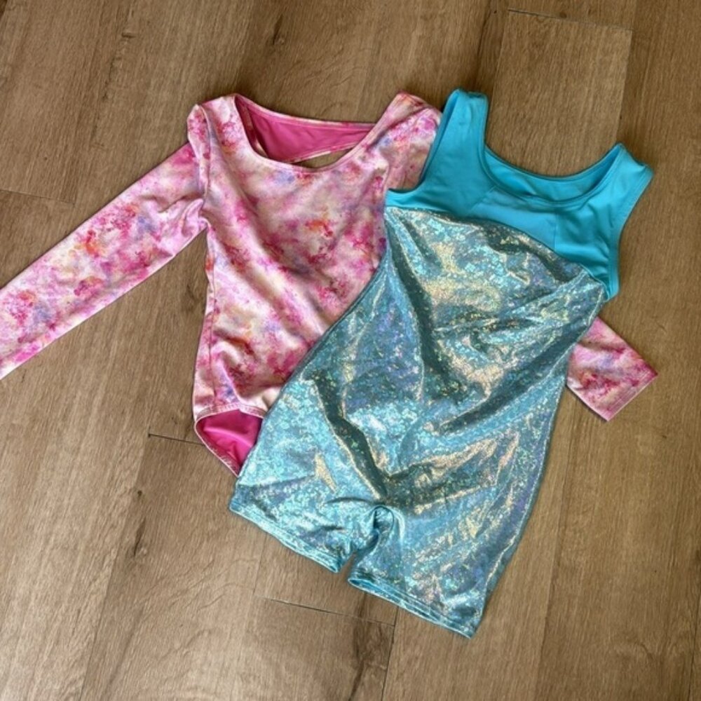 Gymnastics Leotards.  This listing is for both leotards.  Girls size 7/8.